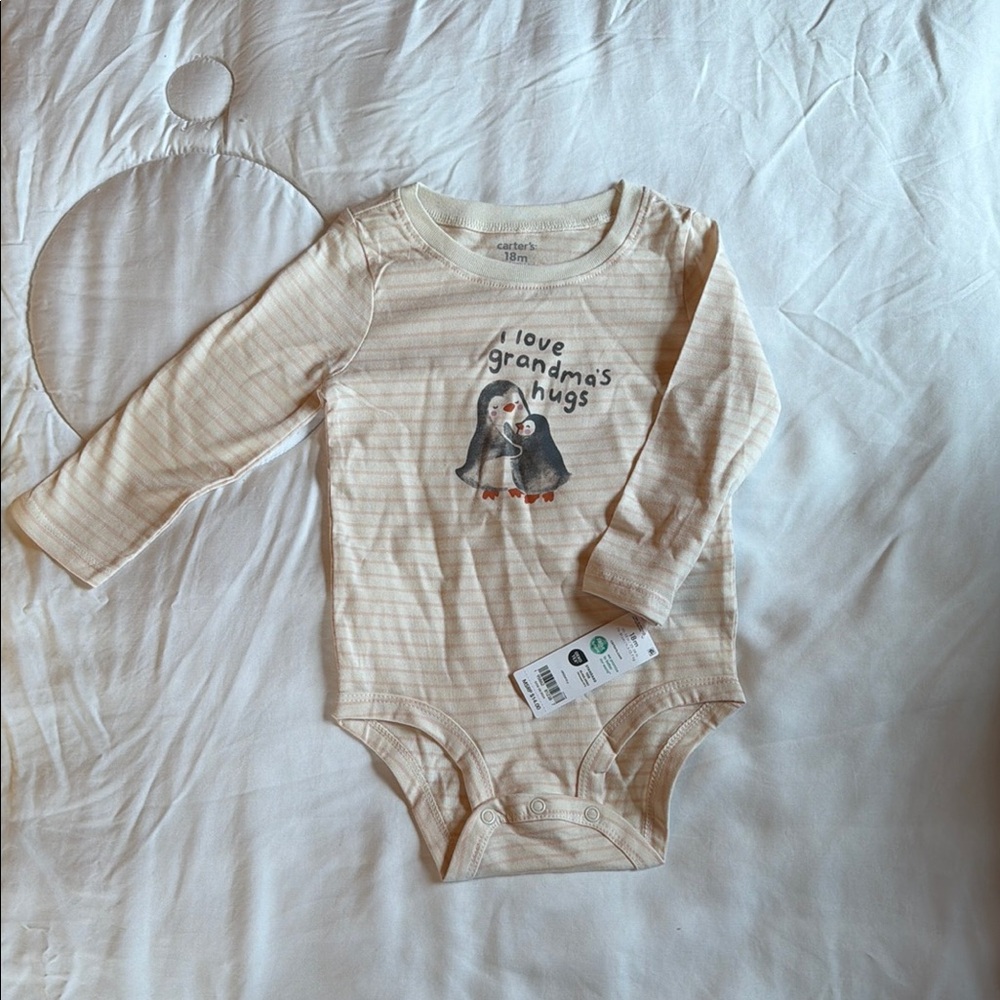 Cream Baby Onesie with Penguin Design